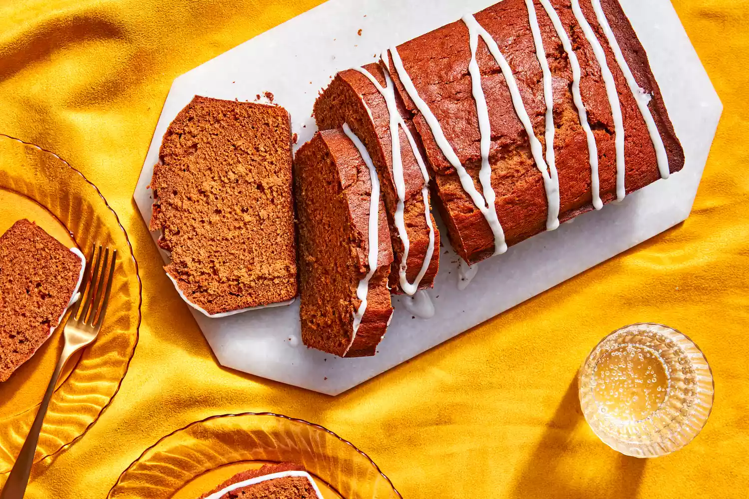 Southern Living Ginger Loaf Cake sliced on a platter to serve