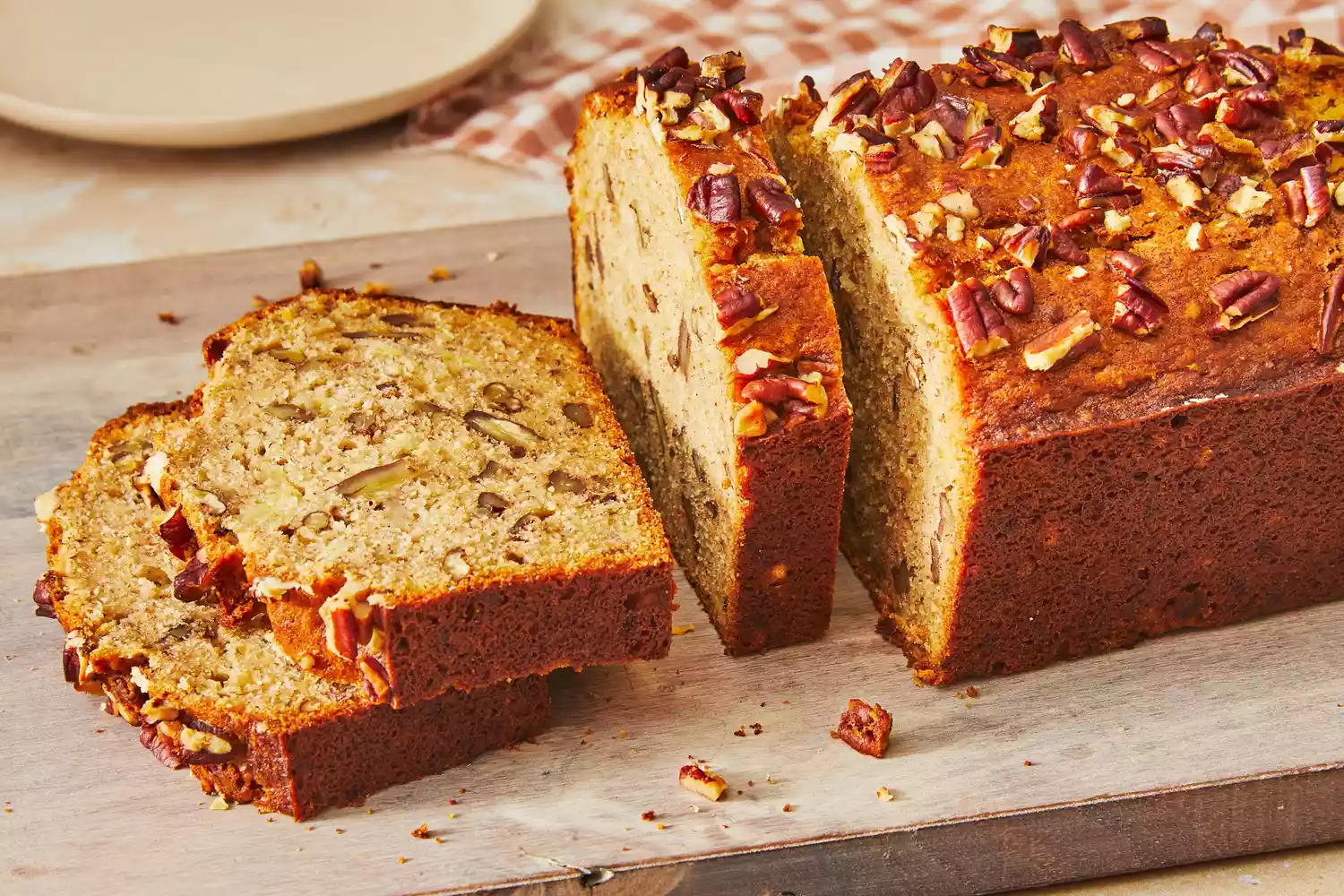 Southern Living Banana Nut Bread sliced on a cutting board to serve