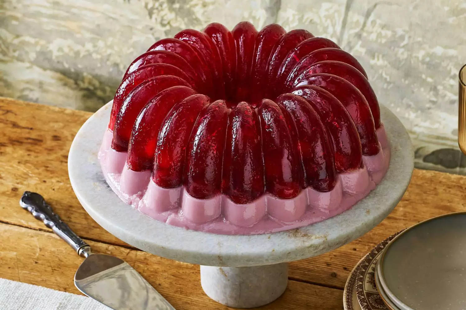 Layered Cranberry Salad on a cake stand