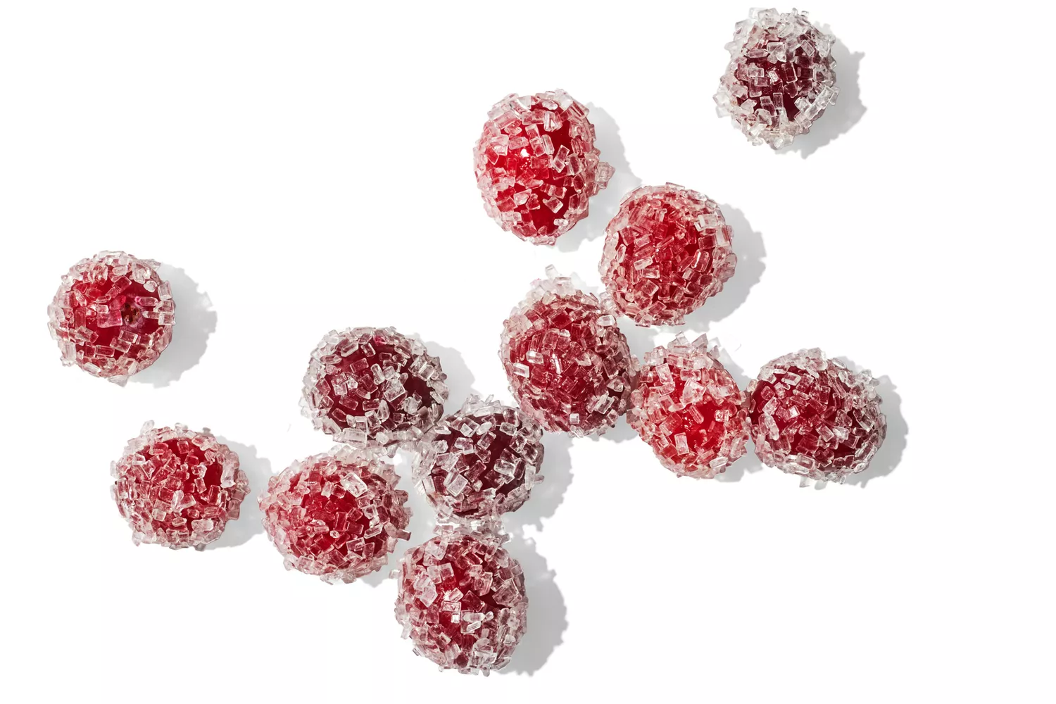 Sparkling cranberries on white background
